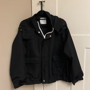 Studious black rain jacket